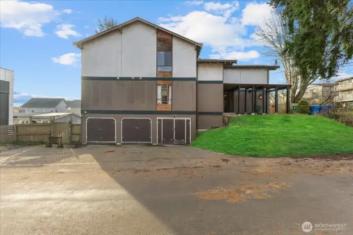 Three secure garages with additional parking for up to 5 cars. Grass is virtual