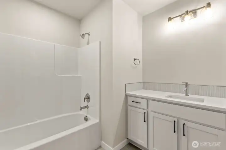 Photographs are for illustrative purposes only. Features, finishes, interior/exterior colors, landscaping and floorplan shown may vary from actual homes built.