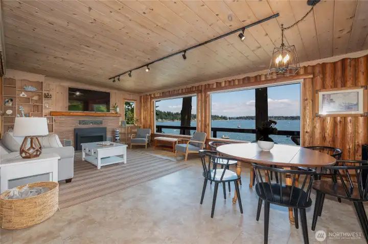 Living room / dining area with wall of windows for amazing views!