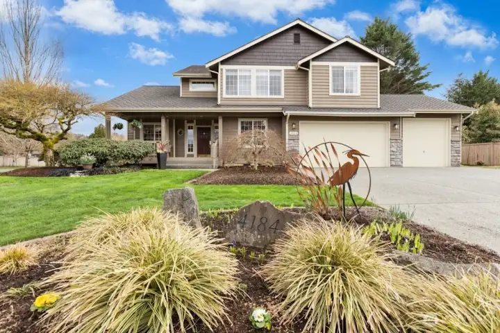 Welcome to Swiftwater! Pristine home and landscaping in this turn-key home on a half-acre corner lot.