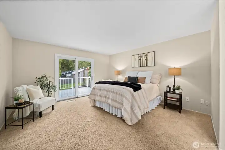 Primary bedroom with direct access to the back deck!