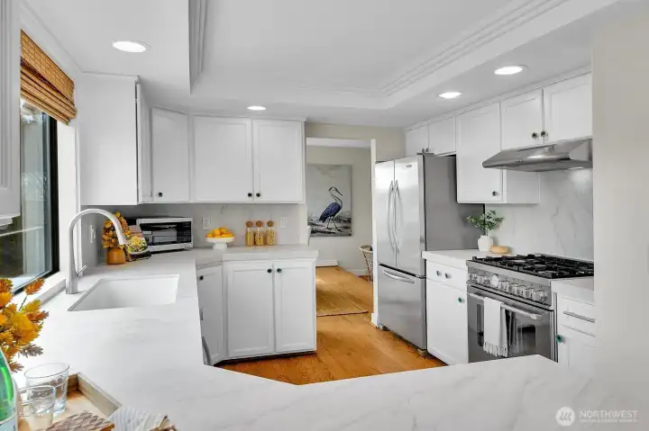 The kitchen was renovated 3 years ago and includes a 6 burner gas range, a stainless, french-door refrigerator and room for more than one chef.
