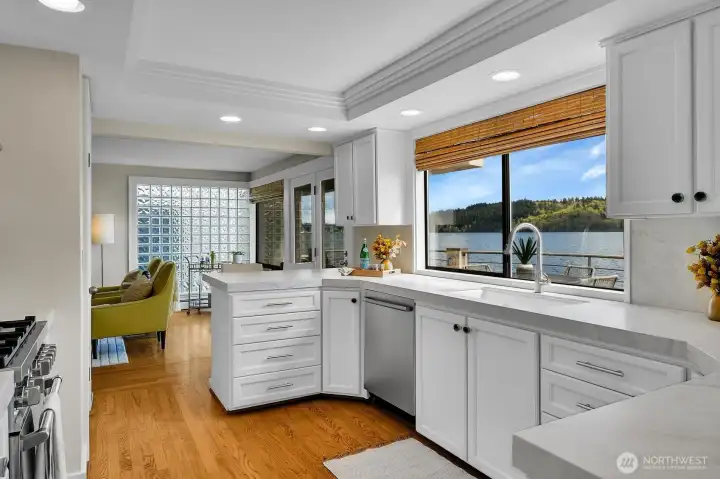 The sliding window above the counter opens for service to a gorgeous outdoor deck. (Not pictured is a separate pantry on the left).