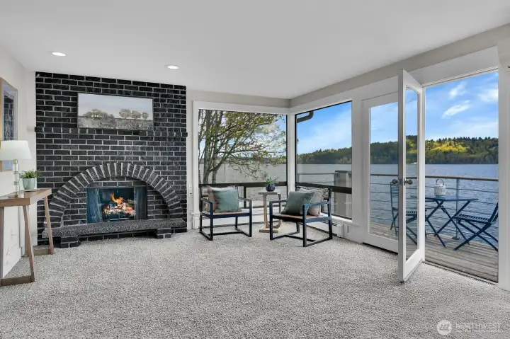 The view from the primary suite goes on forever. This ensuite bedroom also offers a gas fireplace and private deck.