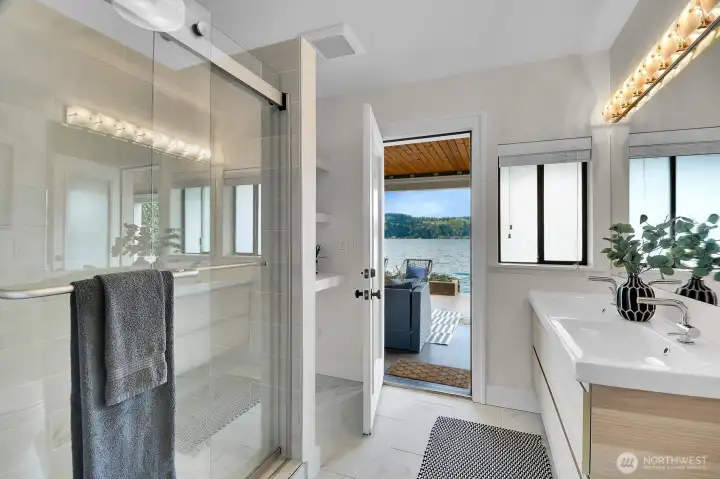 Just got out of the lake? Not a problem. This renovated 3/4 bathroom opens to a covered patio.