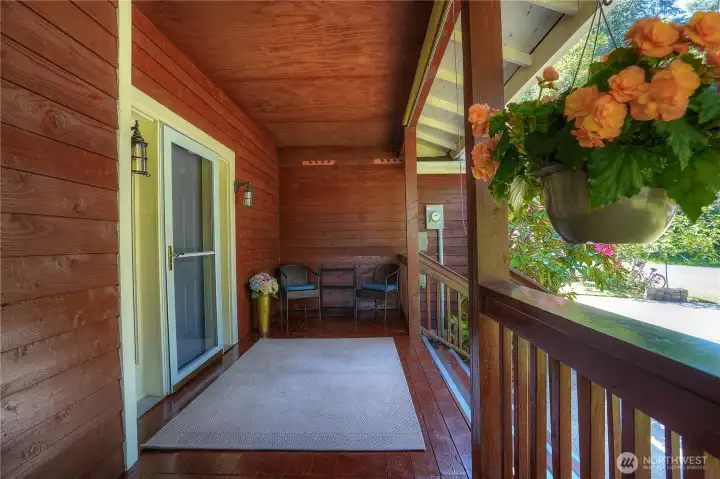 Covered front porch is a nice place to sit.