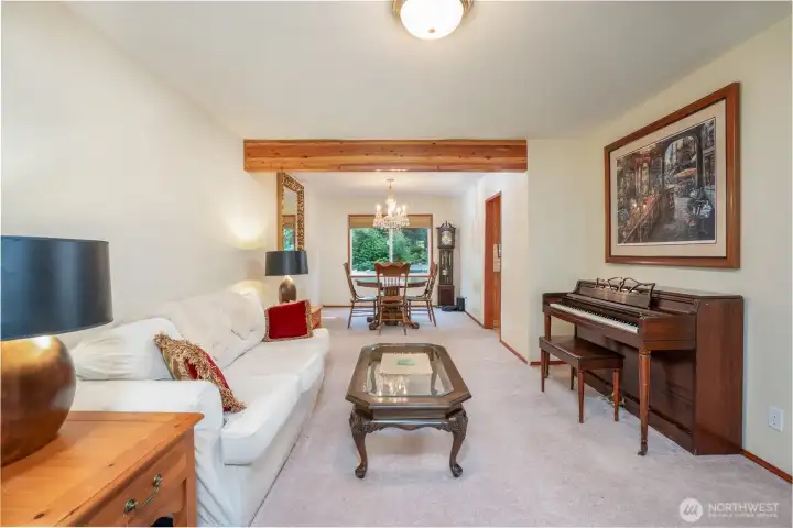 Second view of the living room  with dining room beyond.