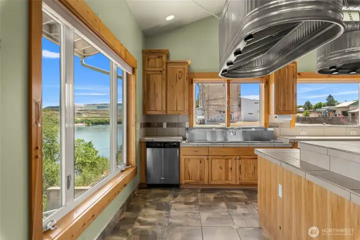 The dishwasher and oversized sinks are only out done by the views and natural light from every window.