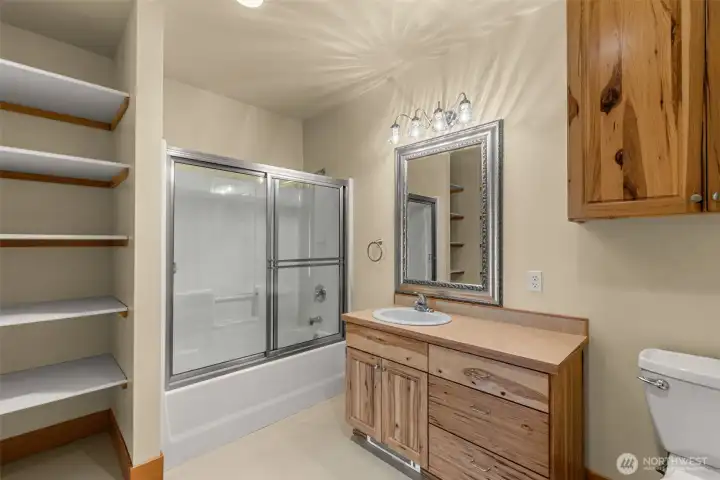 This is one of the two bathrooms located adjacent to each of the bedrooms on the lower level.