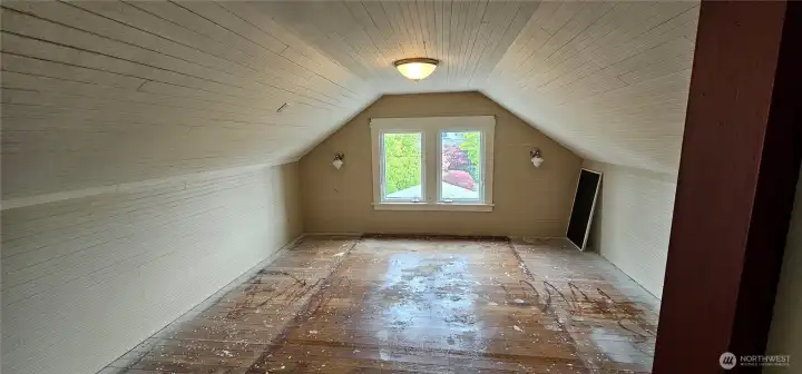 Upstairs is a big room, closet and full bath.