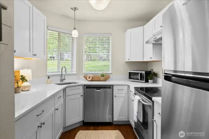 Recently remodeled kitchen with quartz counter tops, new cabinets and SS appliances.