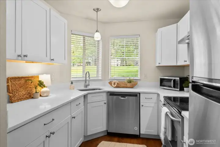 Recently remodeled kitchen with quartz counter tops, new cabinets and SS appliances.