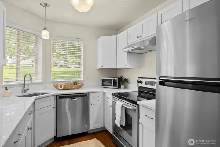 Recently remodeled kitchen with quartz counter tops, new cabinets and SS appliances.