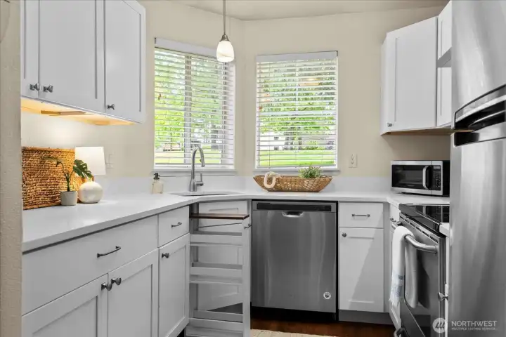 Recently remodeled kitchen with quartz counter tops, new cabinets and SS appliances.