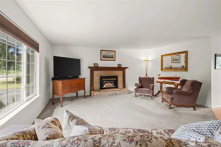 Living room w/ gas fireplace.
