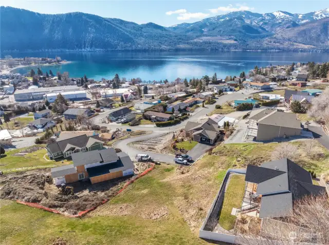 Overview of the lot with sweeping view of Lake Chelan, Wapato Point, Mountains and downtown Manson.
