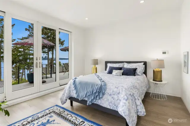 The home offers main-level living, with the primary bedroom conveniently located on the main level, where you can wake up to the soothing sounds of whales.
