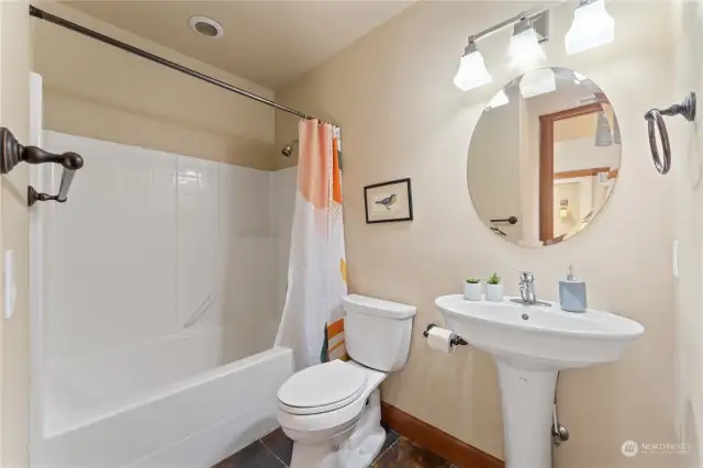 View of upper level guest bathroom adjacent to the upper level loft office w/ extra sleeping area.