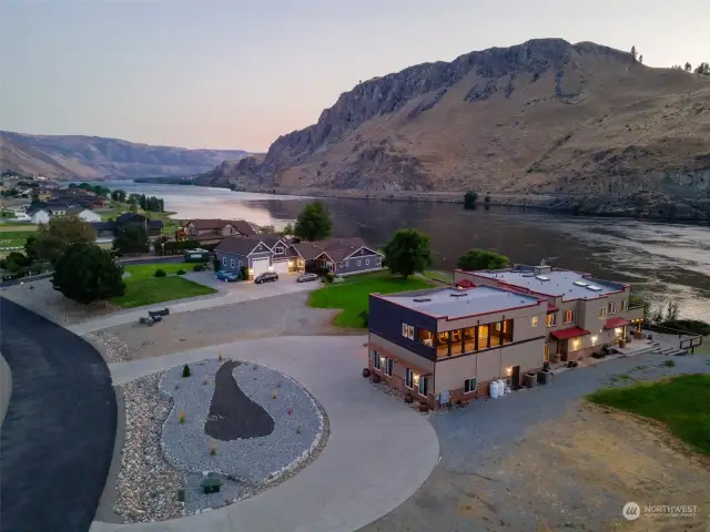 Exterior twilight view 4 of home and property overlooking the Columbia River.