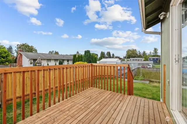 Dual stair case deck for ease of access to the back and side yards.