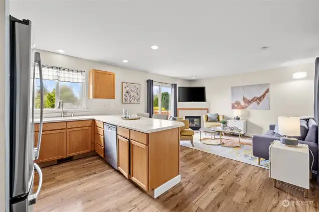 Kitchen is a hub of the home with adjacent living room.