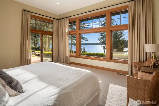 Primary suite with a magnificient view to Puget Sound. Listen to the wind whistle through the trees.
