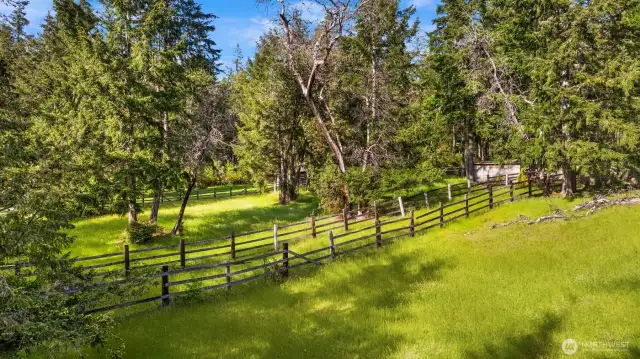 Fenced in pastures for those Equestrians.