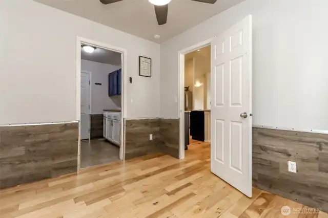 Office space between dining room and utility room. Has a doggie door.
