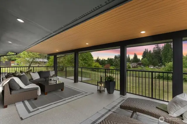 Enjoy beautiful sunsets from your deck while overlooking your beautiful lot and scenery.