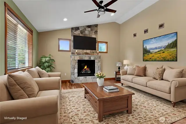 The living room is cozy yet nice sized. This is one example of what this room could look like with you in it!