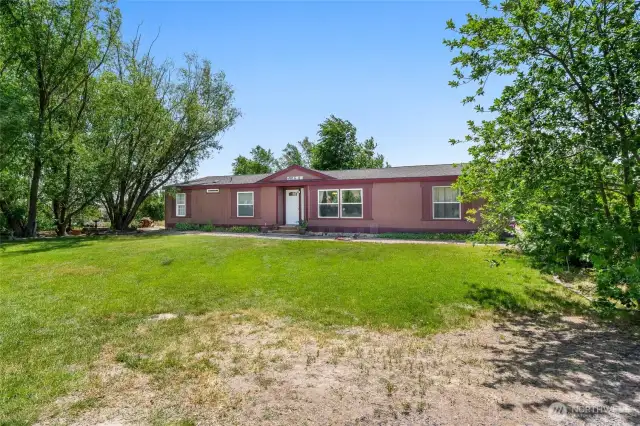 Welcome to this spacious 4-bedroom, 2-bath home
