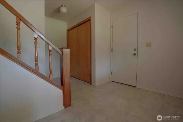 Split level entry way. 2 bedrooms with living space below. 2 bedrooms with main kitchen and living room above & more !   Garage entry to the right.