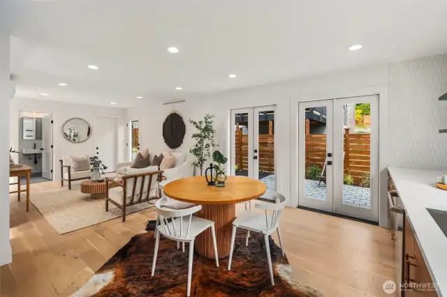 East facing double french doors make breakfast mornings a welcome treat.