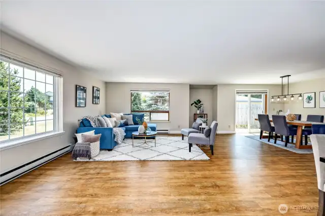 Living room with large picture window looking East