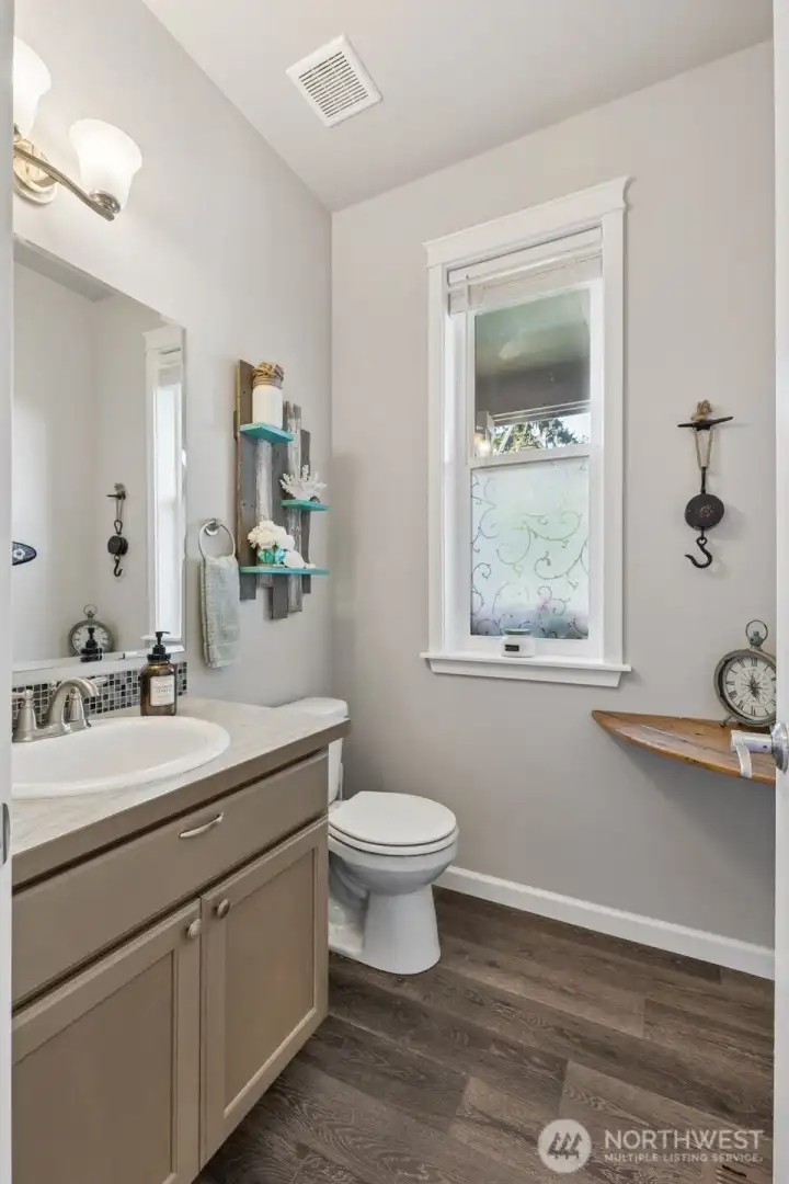 Private 1/2 bath away from living room.