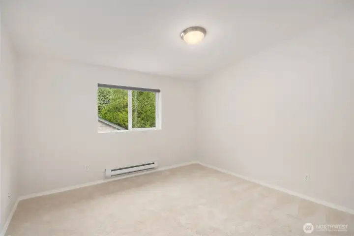 Primary bedroom with custom black out shade