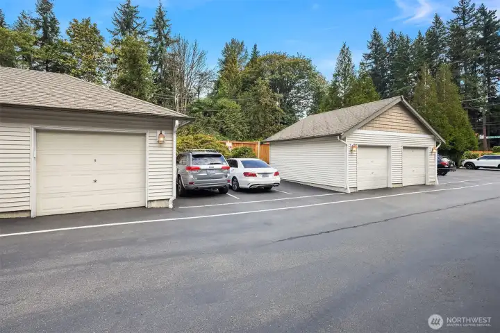 Guest parking located beside garage.