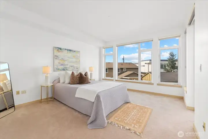 primary suite with access onto spacious deck