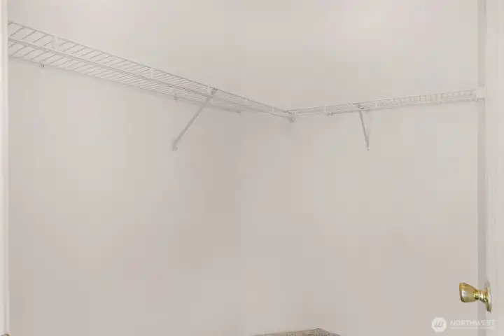 Walk in master suite closet