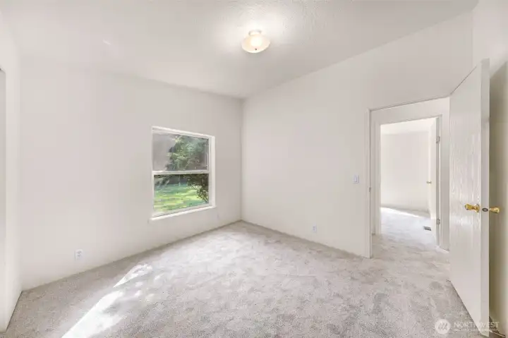 New paint and carpet in both additional bedrooms...sunny as well