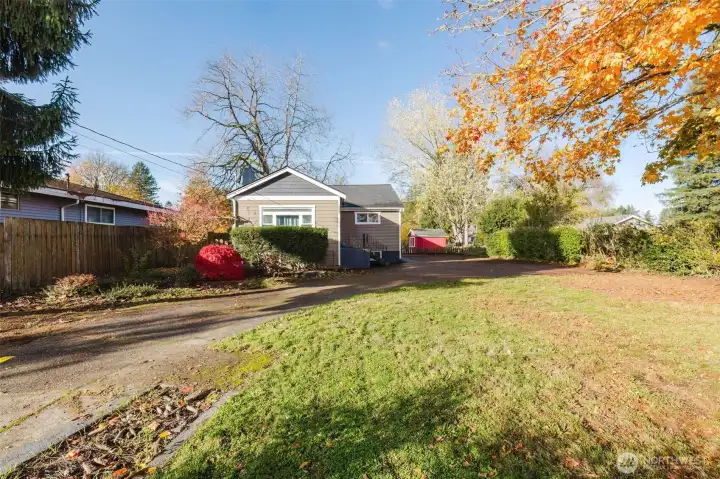Tree on left side of driveway has since been removed, allowing even more morning sunshine.