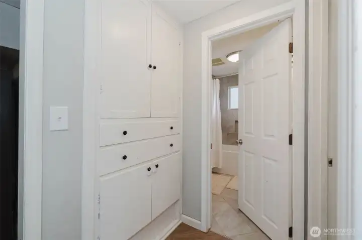 Built-in storage next to main level bathroom