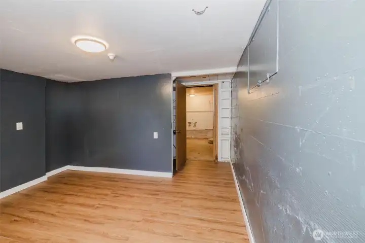 Large room located near separate back-door entry.