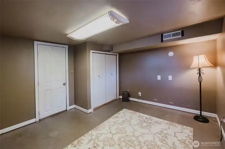 Fourth bedroom, located immediately on the left downstairs.