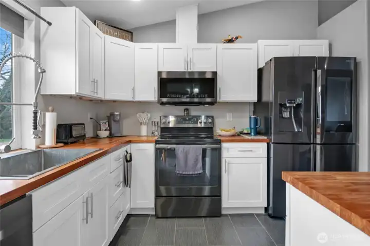 Plenty of cabinet and counter space. Large, deep sink and designer faucet.
