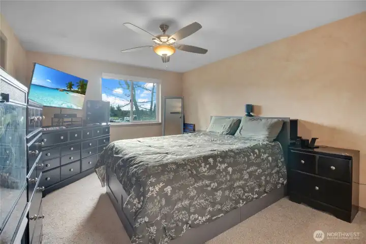 Primary bedroom is on the upper level and has a full bath attached and walk-in closet.