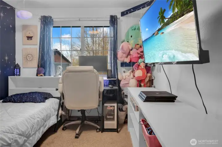 Secondary bedroom on upper level.