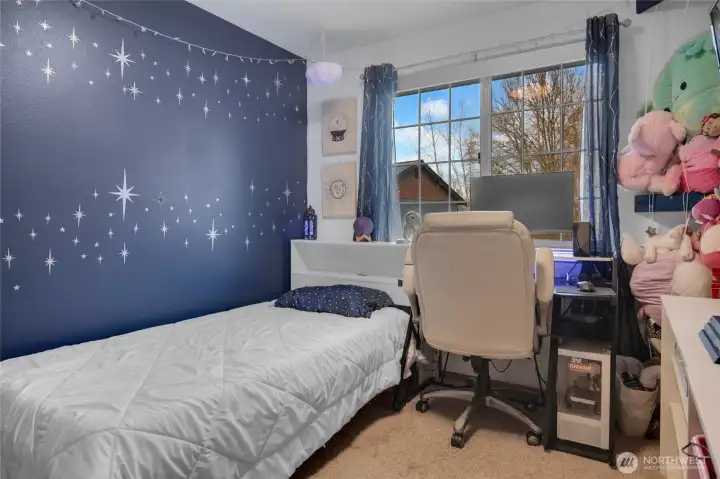 Another view of one of the secondary bedrooms on the upper level.