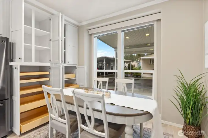 So much storage! Pull outs in lower shelves throughout kitchen