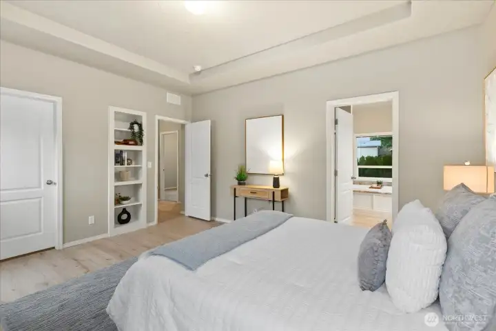 Large primary with walk in closet and built ins. 5 piece en-suite